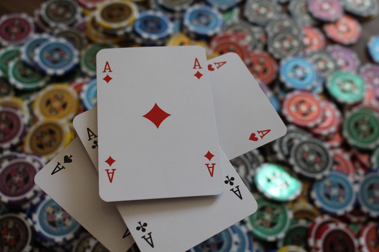 Colourful casino chips and digital coins