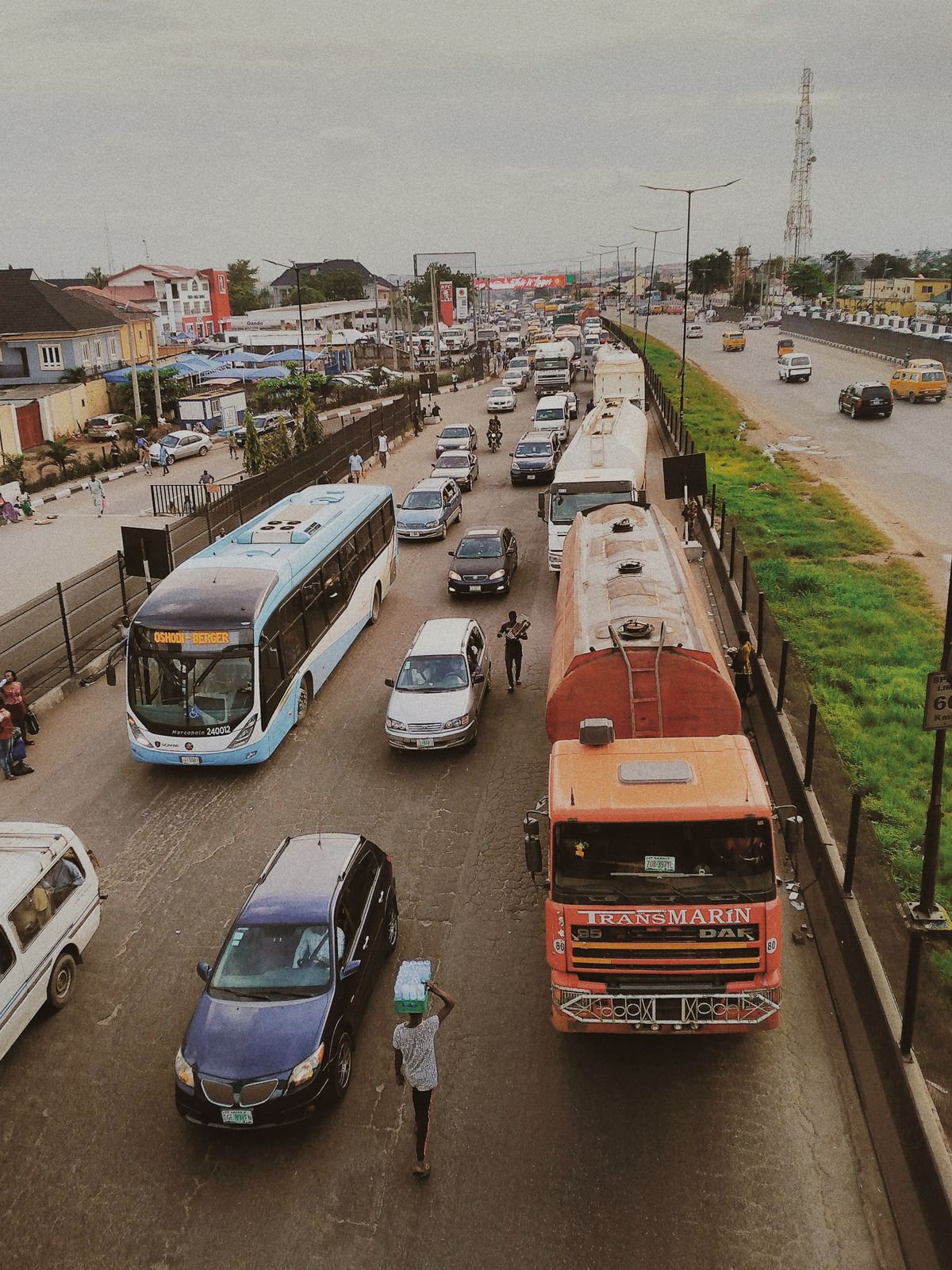 Busy Lagos street scene with traffic and pedestrians