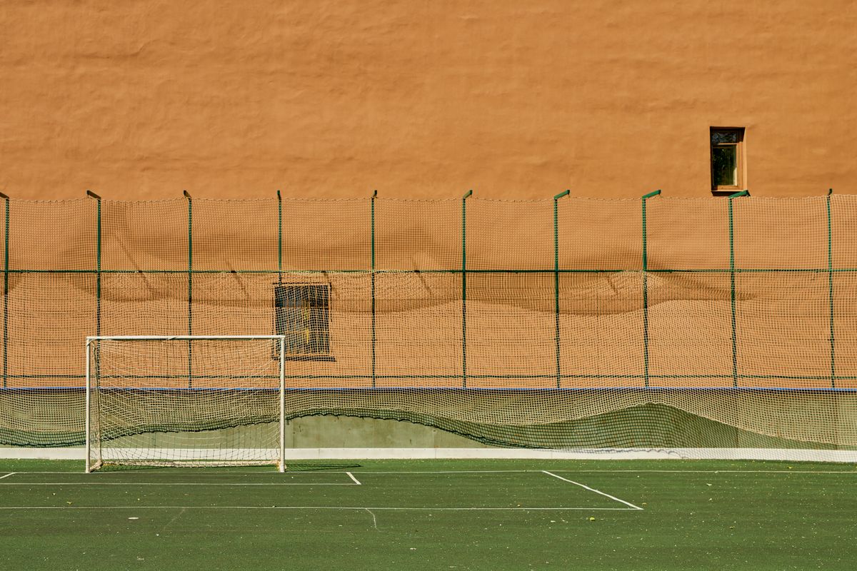 White football goal on artificial turf field