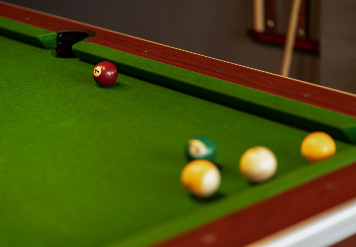 Snooker balls arranged on a green baize table in close-up